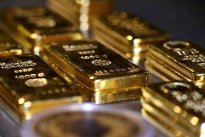 تضخم في الولايات المتحدة مع تراجع أسعار الذهب وارتفاع الدولار